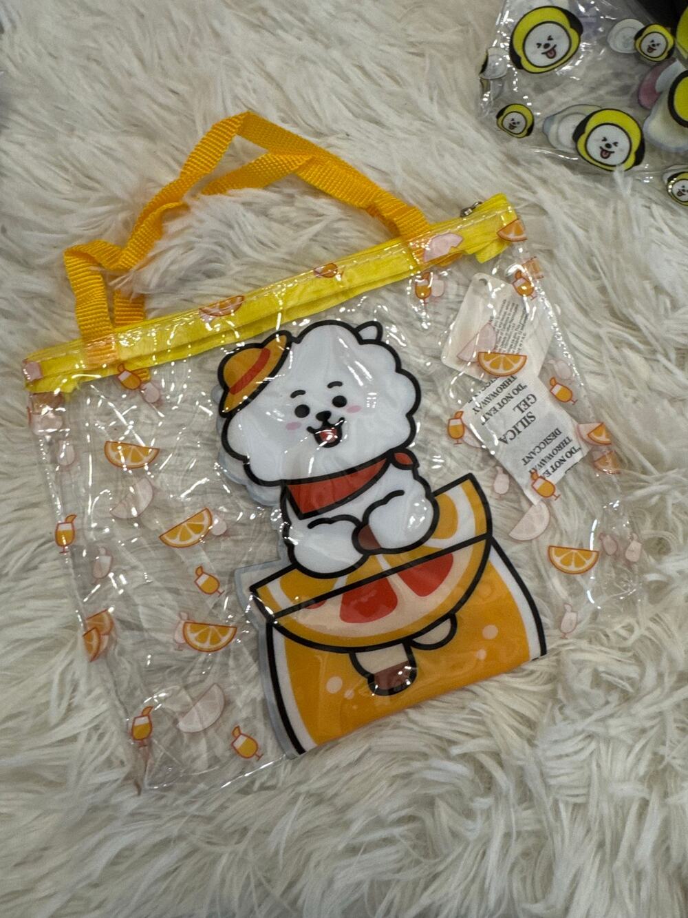 BT21 RJ Jin holding an orange slice clear tote makeup pencil pouch bag zipper